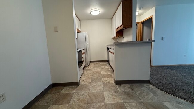1 Bedroom Lower | Kitchen - Terrace at Cedar Glen | Cross Plains Apartments - Elkhorn Village
