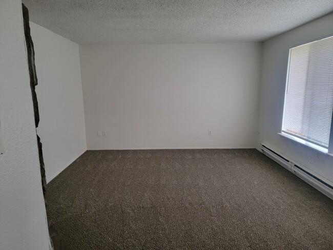 Photo - Spacious Spanaway rambler with covered patio and fenced yard.