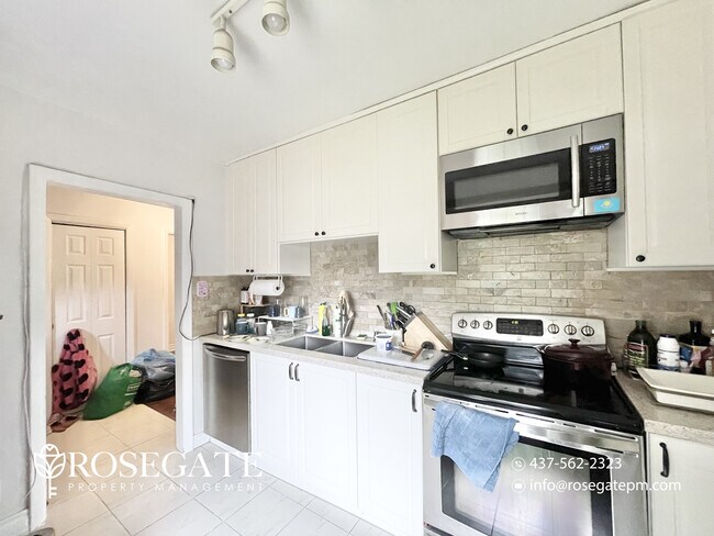 Photo - Charming 3-Bedroom Home with Backyard & Pa... Unit 1