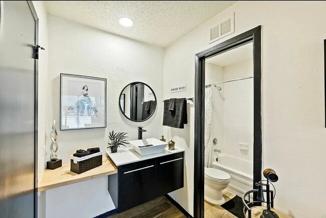 Experience modern living at The WerX. This stylish bathroom features contemporary fixtures, sleek finishes, and ample storage for your convenience. Elevate your lifestyle in a space designed for comfort and functionality. Schedule a tour today!
