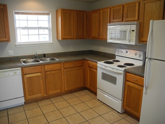 Photo - Condominium in Academy Commons Unit D