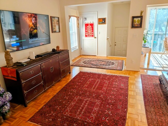 Large smart TV in a roomy living room - 106 Siena Way Unit Nicolas and Marie Pataky