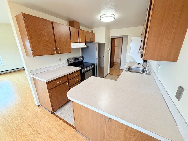 Bright Penthouse Corner Unit w/Garage Parking included - Panoramic Views in Ballard!