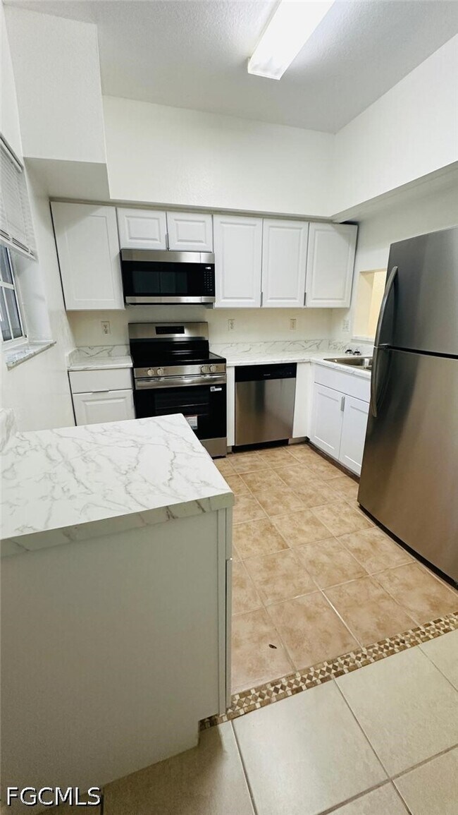 Photo - 8484 Bernwood Cove Loop Unit 1301