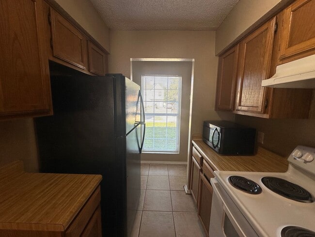 Photo - Spacious 2 story town home with fenced yard!