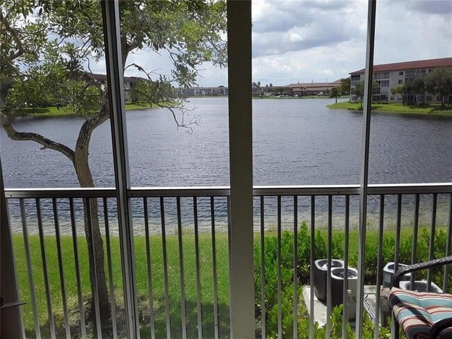 Building Photo - 12950 SW 13th St Unit 211D