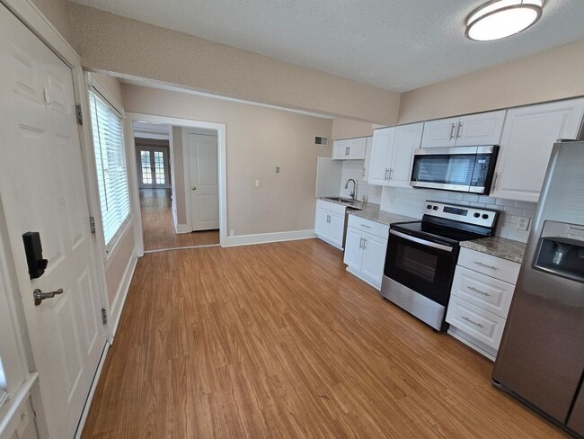 Photo - large three bedroom house with extra living space and finished basement