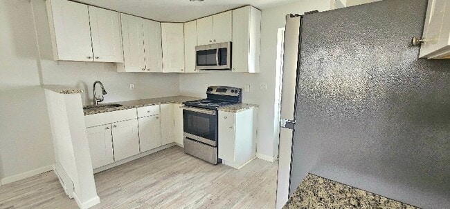 Photo - 125 Cosey Beach Ave Unidad A1