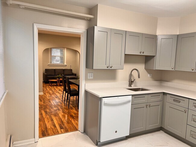Kitchen looking towards living room and dining room - 812 Beloit Ave Unit 1