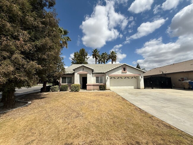 Building Photo - Spacious 4-Bedroom Home in Southwest Baker...