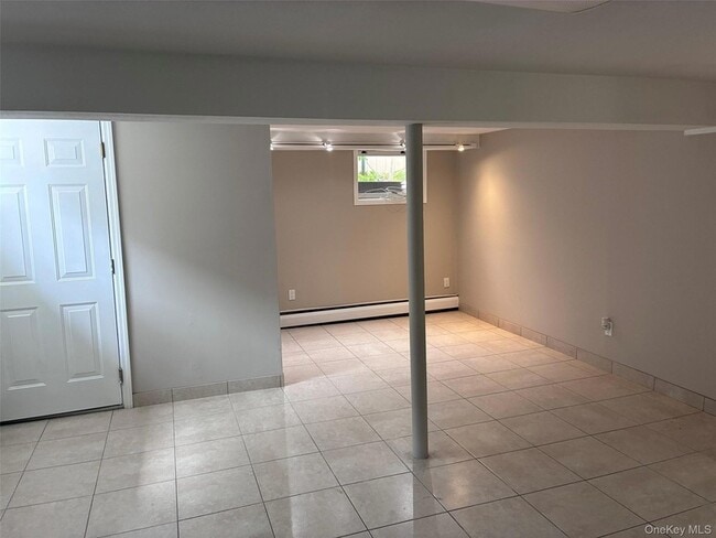 Photo - 56-25 136th St Unit 1FL