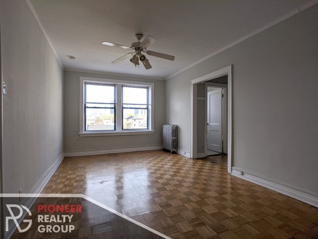 Building Photo - 711 W Belmont Ave Unit #711-502 Rental