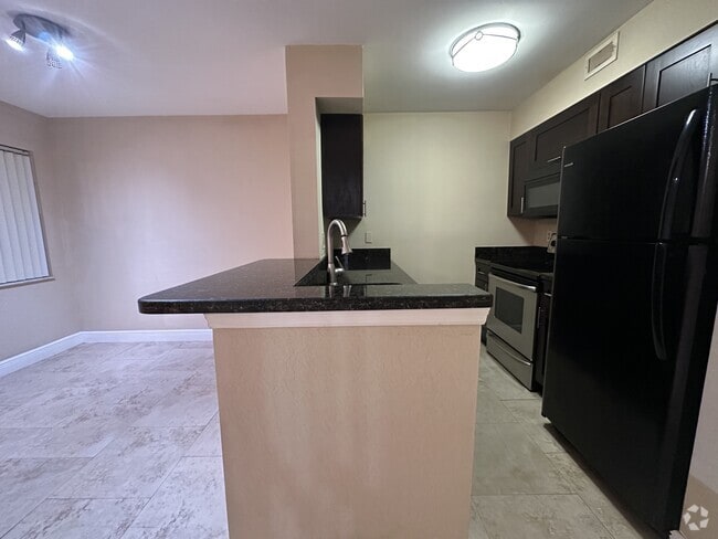 Building Photo - 2820 N Oakland Forest Dr Unit 208 Rental
