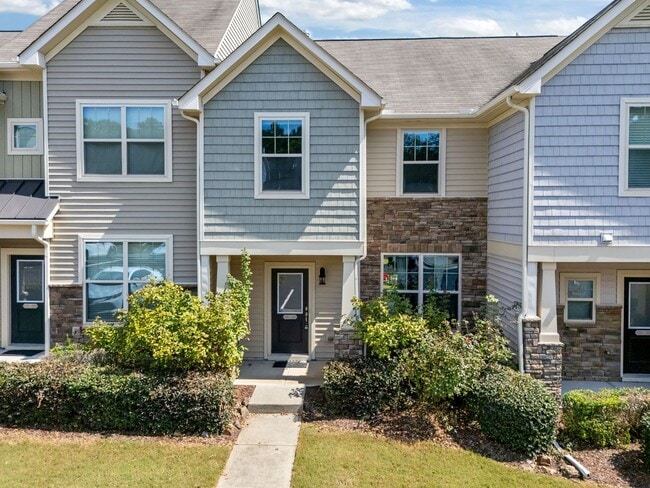 Building Photo - Modern 3-Bed Townhome in Thompson Ridge – ...