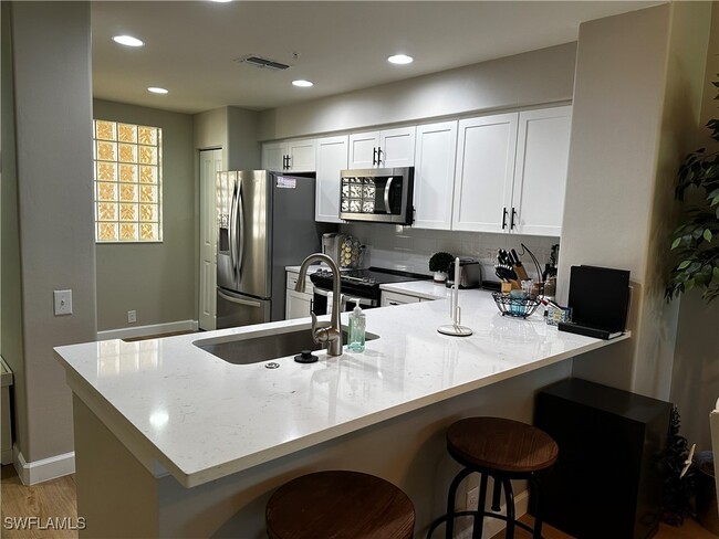 Building Photo - 16430 Millstone Cir Unit 103 Rental