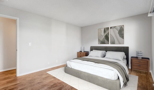 Large bedrooms with wood flooring throughout