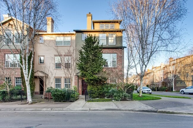 Building Photo - Stylish Townhome with Dual Primary Suites, Bonus Room & Prime Location Near Intel!