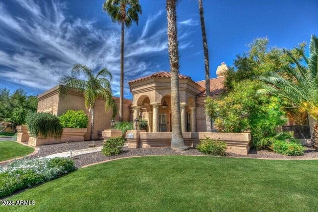 Building Photo - 1502 W Port Au Prince Ln