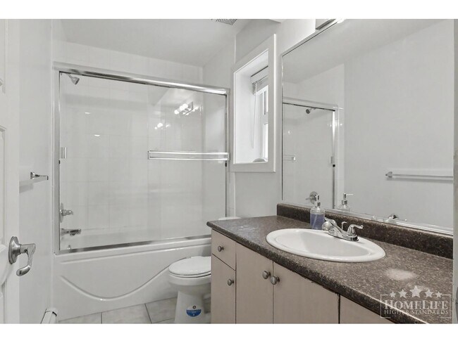 Photo - 6125-6148 148 St