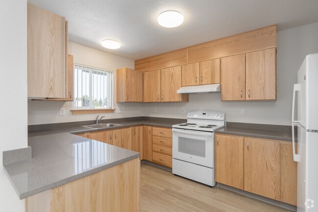 3BR, 2BA - 1,190SF - Kitchen - Cornelius Village Apartments