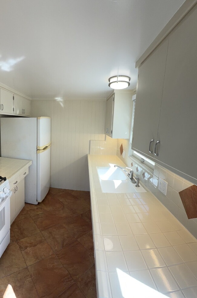 Building Photo - Sunsets Over the Pacific from Your Cottage Living Room, While the Waves Roll in Below. Every Even... Unit 27
