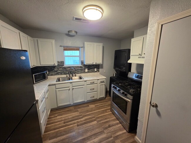 Photo - Recently remodeled 2-bedroom home close to the square