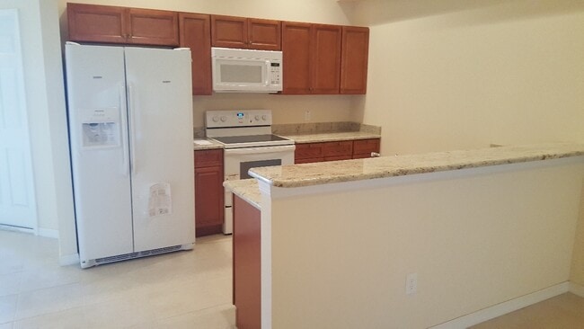 Photo - NEWER 3 bedroom 2 bath 1 car garage duplex in SW Cape!!  Lawn Care Included~