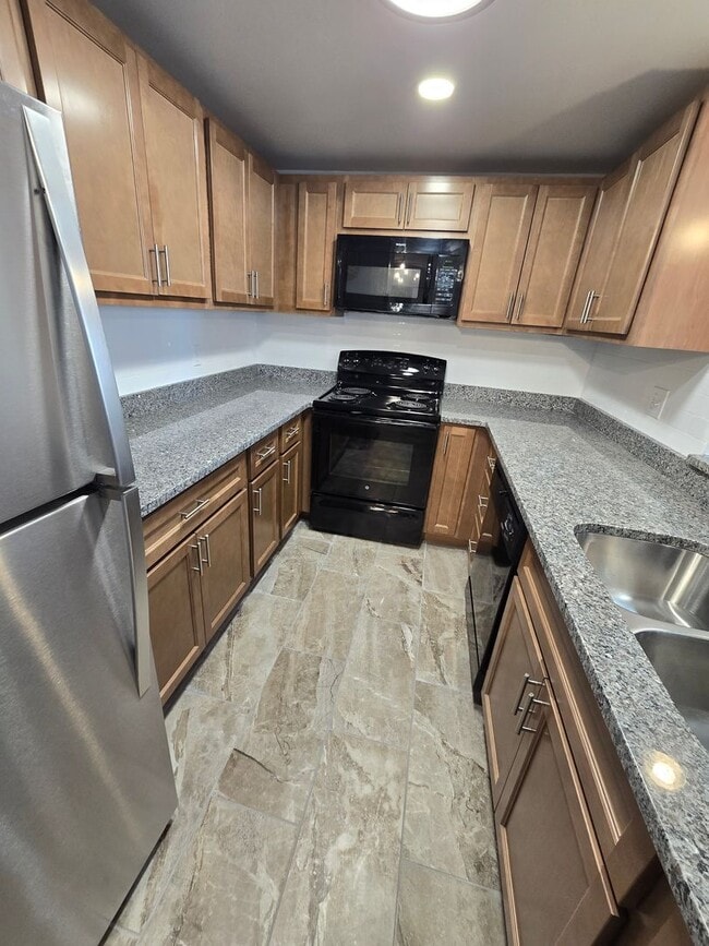 Photo - Beautifully renovated TWO-bedroom Condo on third floor with charm.