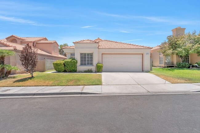 Building Photo - Vaulted Ceilings, Cozy Fireplace & Desirable Single-Story Living Near The Lakes!