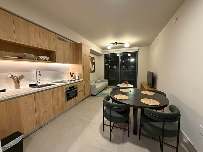 Building Photo - 11 NE 6th St Unit FL2-ID1404480P