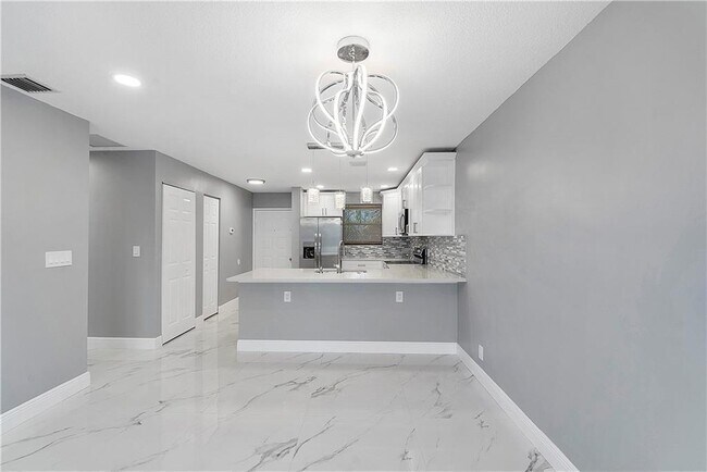 11477 NW 39th Ct Unidad 305-1