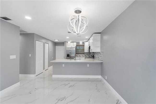 Photo - 11477 NW 39th Ct Unit 305-1