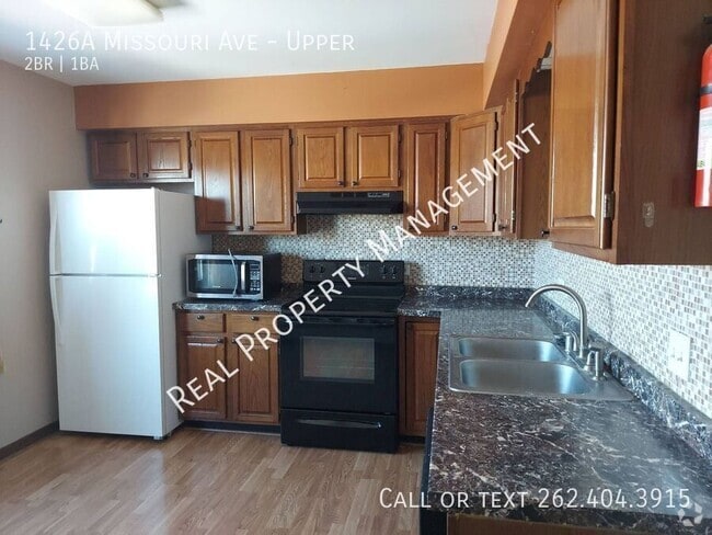 Building Photo - 1426 Missouri Ave Unit Upper Rental