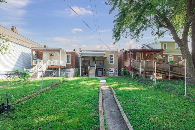 Photo - Beautiful home with fenced in yard and covered rear deck in Southwest Garden