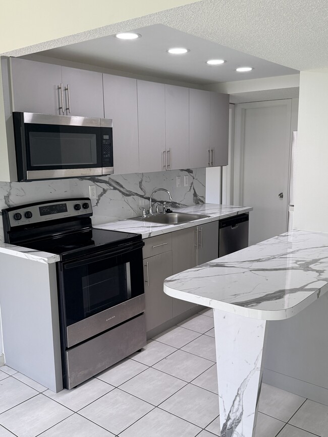 New kitchen ,new all appliances , new ac - 9321 SW 4th St Unit 210
