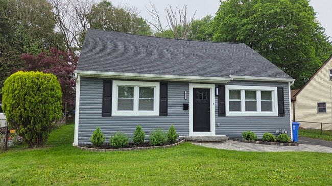 The front of the house has been beautifully updated for both style and durability. Featuring a brand - 604 Holly Ln House