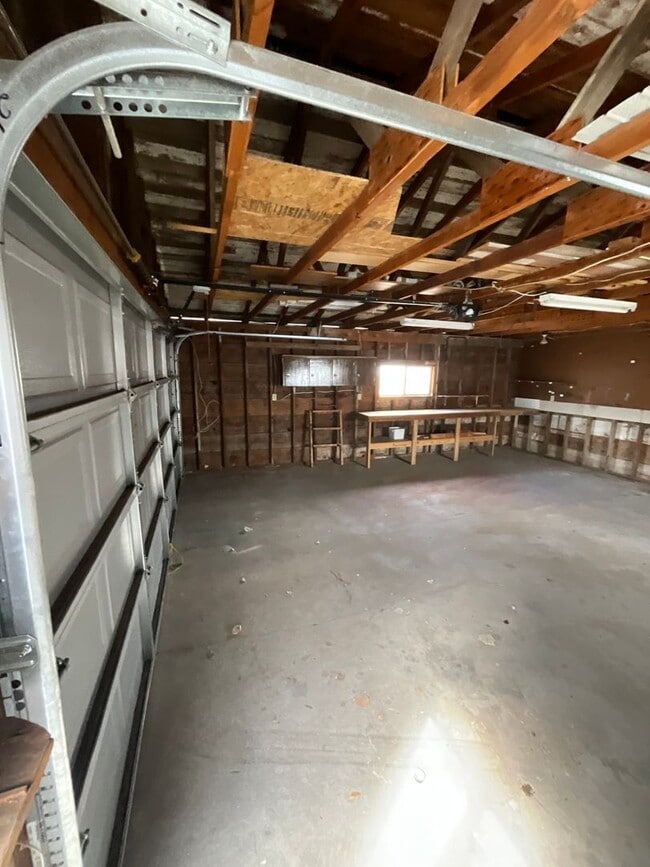 Photo - 3 Bed 1 bath with large 2 car garage close to schools.