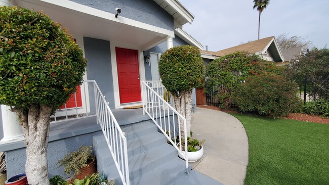 Entry Door on the right, next to the other unit's entry door - 3305 W 27th St House