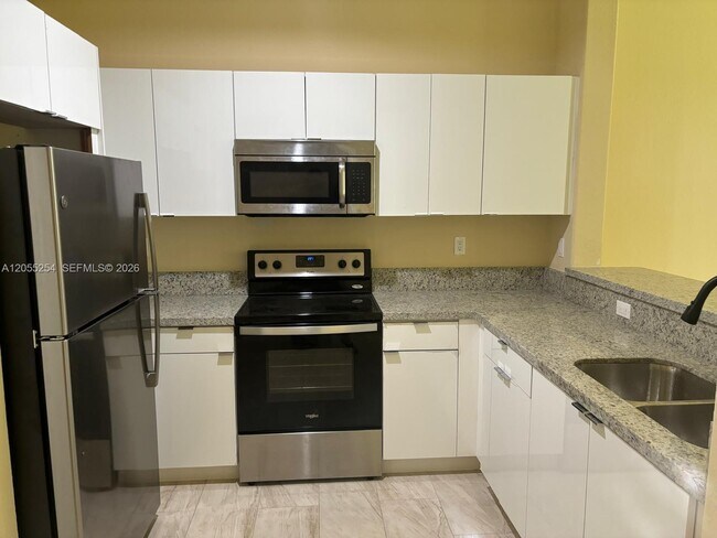 Photo - 1568 SE 26th St Unit 204