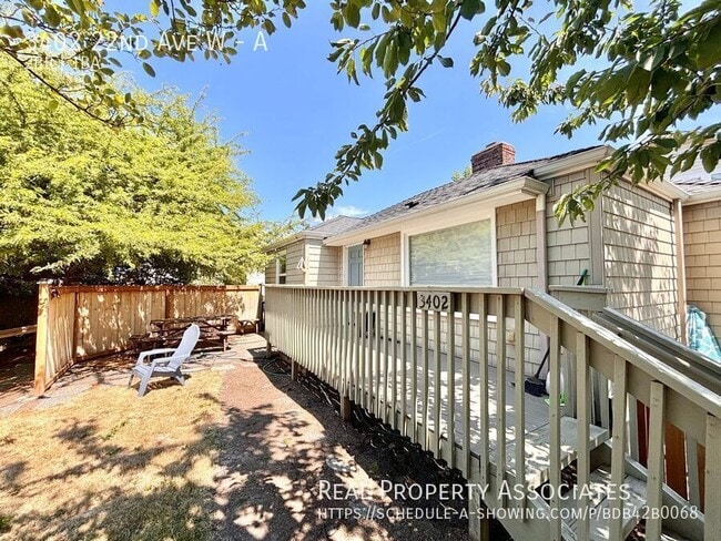Building Photo - 3402 22nd Ave W Unit A