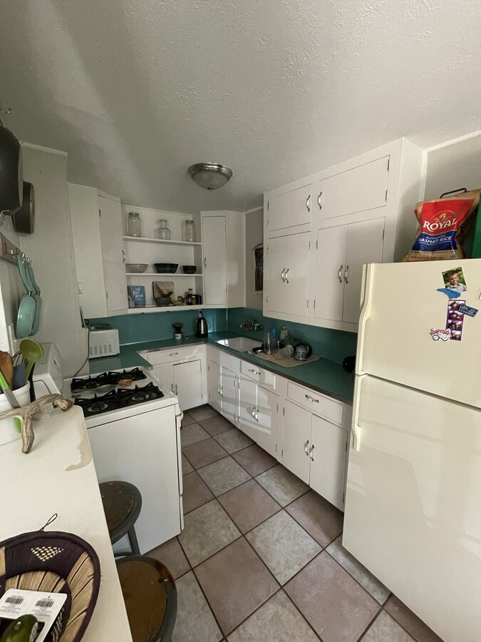Does not include new fridge, microwave and range - 1409 North Rim Drive Unit 1409