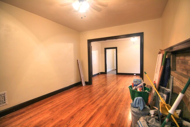 Photo - This 2 bedroom 1 bath home has been completely refinished with brilliant hardwood floors throughout!