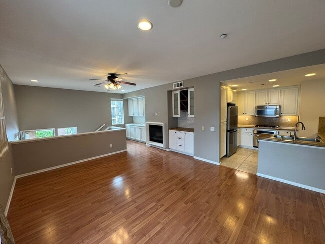 Photo - Sleek 2-Bed with a Den/Office + Flex Corner Condo with Attached Tandem Garage