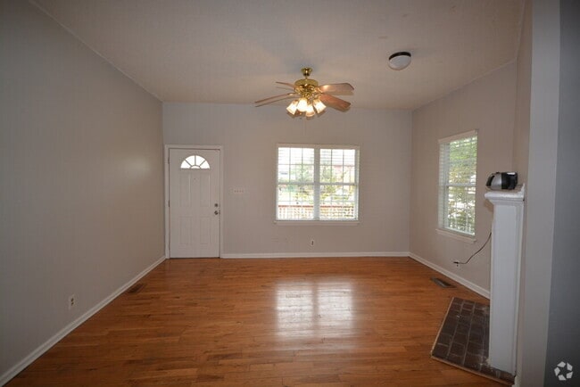 Building Photo - "Charming 3-Bedroom Retreat with Hardwood ... Unit A Rental