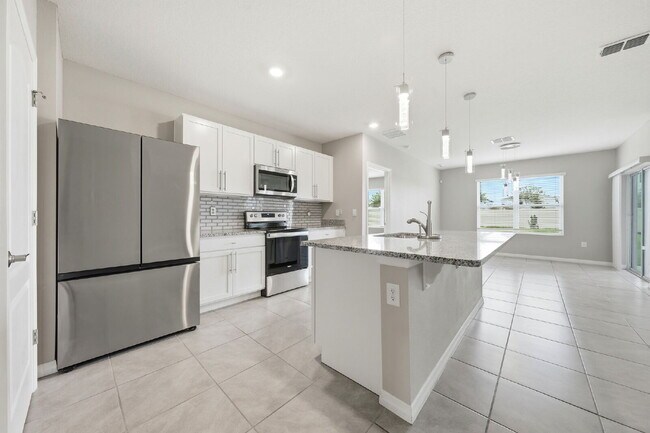 Photo - Three Bedroom, 2 Bathroom single family home with 2 Car Garage.