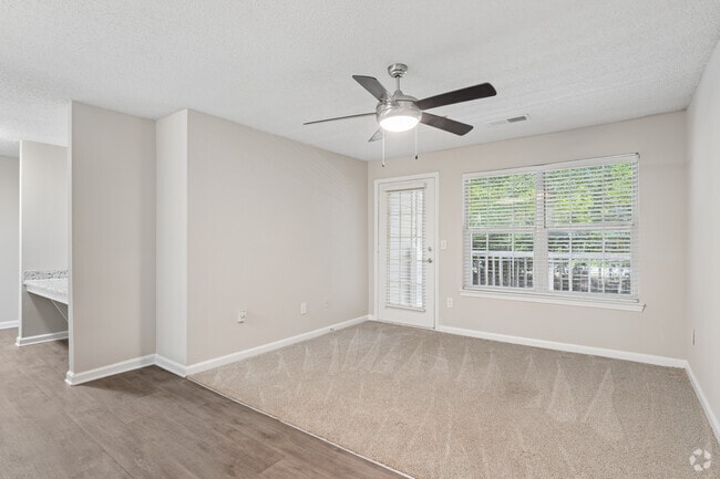 3BR, 2BA - 1,365SF - Living Room - Ashford at Spring Lake