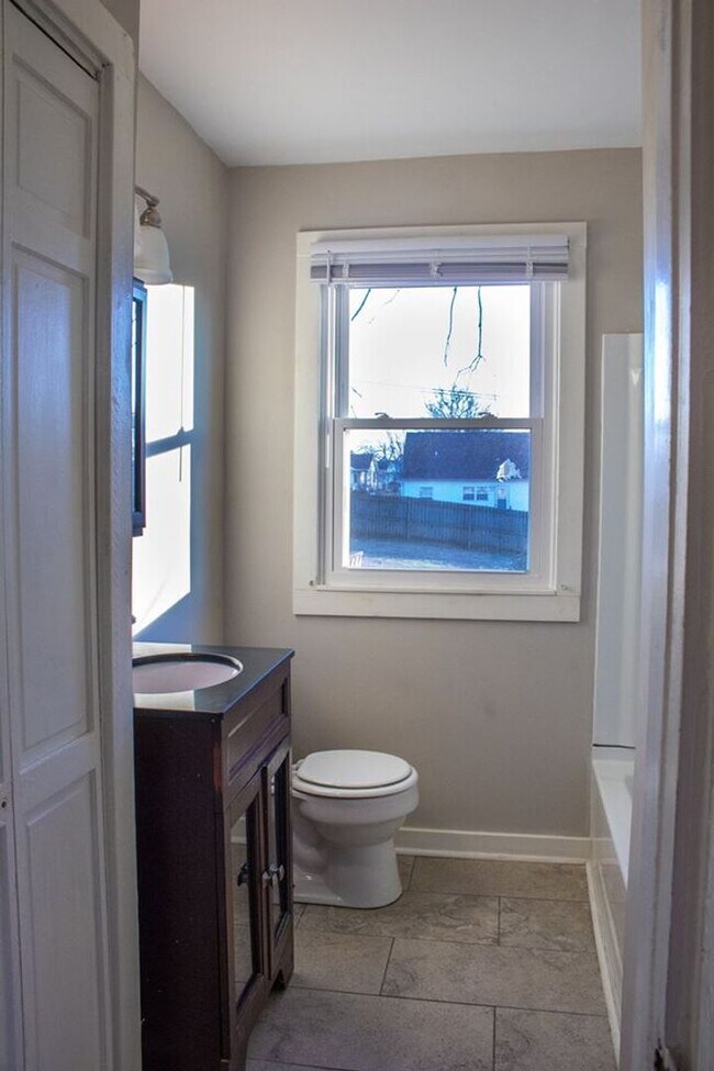 Photo - AVAILABLE NOW. $1300 PER MONTH. NEW STAINLESS STEEL APPLIANCES and UPDATES!!