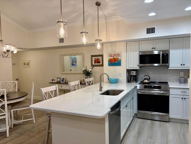 Building Photo - 242 Village Blvd Unit 2304