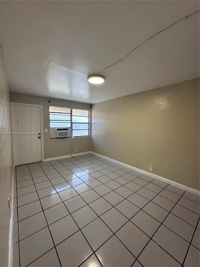 Building Photo - 5797 Flagler St Unit 3