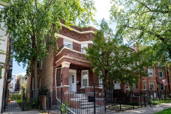 Building Photo - 6111 S Eberhart Ave Unit 1